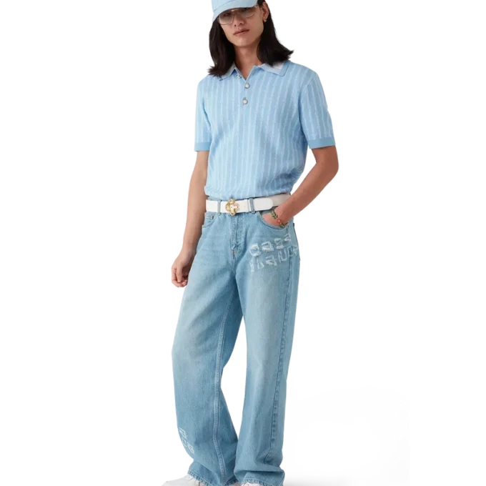 Calças de ganga com efeito desgastado e grafite Calças de ganga com efeito desgastado e grafite