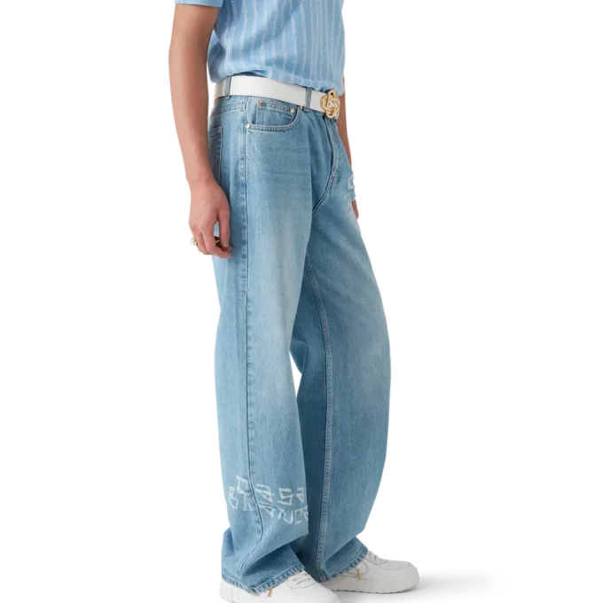 Calças de ganga com efeito desgastado e grafite Calças de ganga com efeito desgastado e grafite