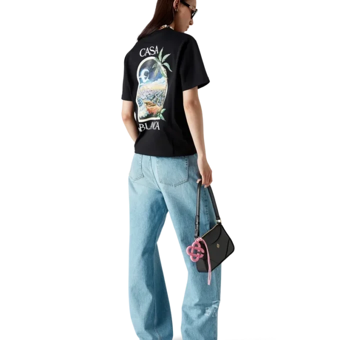 Calças de ganga com efeito desgastado e grafite