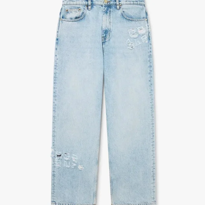 Calças de ganga com grafite em lavagem clara