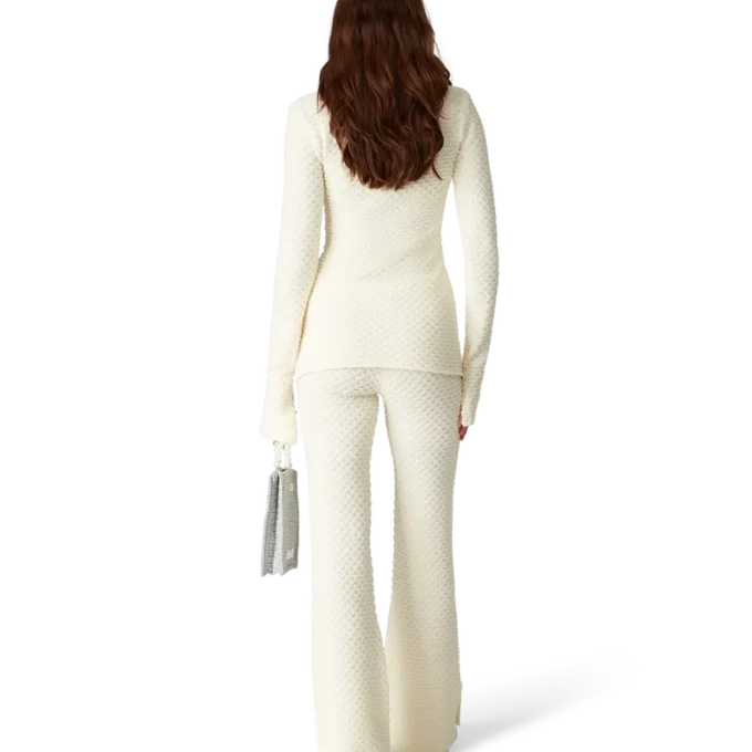 Calças de malha texturizada