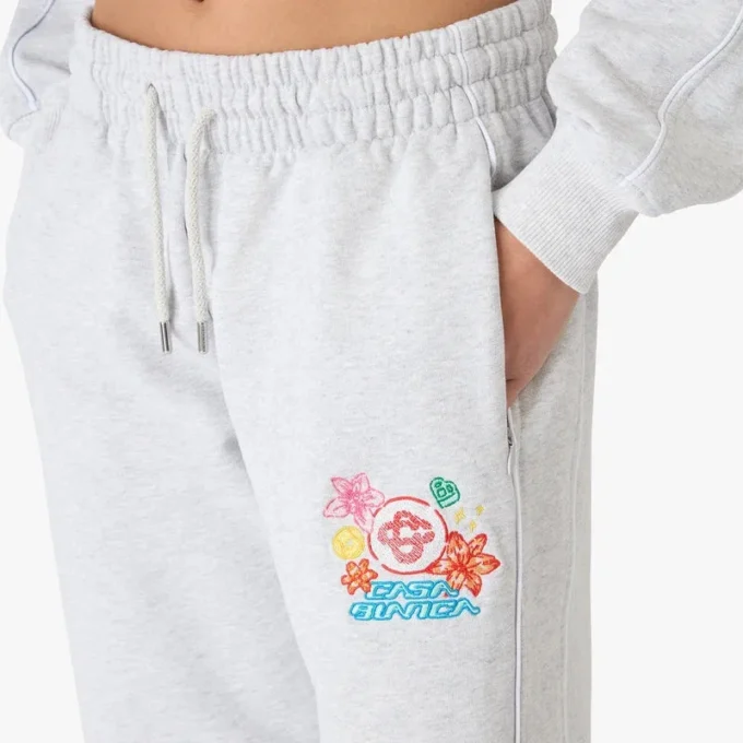 Calças de treino curtas cinzentas com bordado