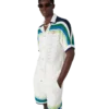 Camisa de malha de manga curta às riscas Camisa de malha de manga curta às riscas