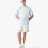 Camisas de manga curta oversized com tie-dye azul e logótipo CC Smile Camisas de manga curta oversized com tie-dye azul e logótipo CC Smile