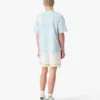 Camisas de manga curta oversized com tie-dye azul e logótipo CC Smile Camisas de manga curta oversized com tie-dye azul e logótipo CC Smile