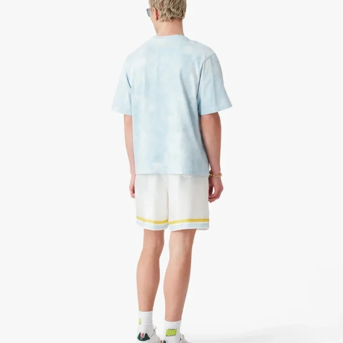 Camisas de manga curta oversized com tie-dye azul e logótipo CC Smile Camisas de manga curta oversized com tie-dye azul e logótipo CC Smile