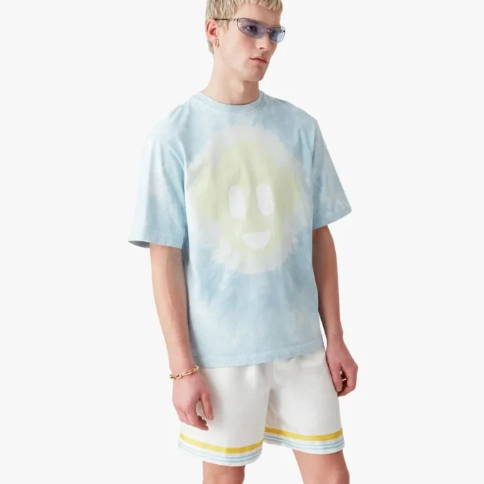 Camisas de manga curta oversized com tie-dye azul e logótipo CC Smile Camisas de manga curta oversized com tie-dye azul e logótipo CC Smile