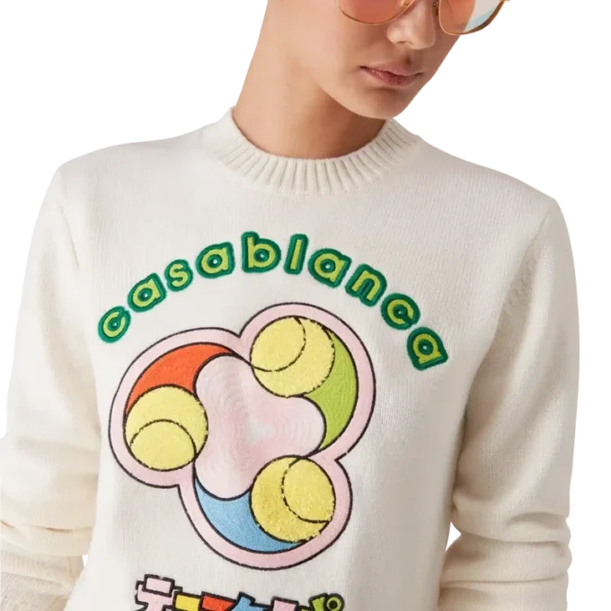 Camisola de gola redonda em malha de lã merino com padrão de bolas de ténis