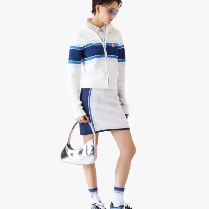 Casaco bomber em malha às riscas brancas e azuis Casaco bomber em malha às riscas brancas e azuis