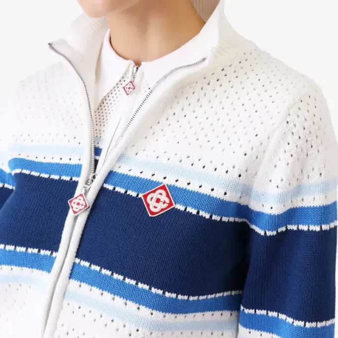 Casaco bomber em malha às riscas brancas e azuis Casaco bomber em malha às riscas brancas e azuis