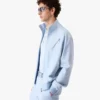 Casaco com fecho em jacquard azul claro Casaco com fecho em jacquard azul claro