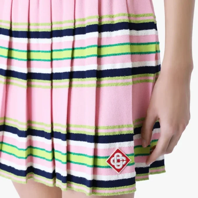 Mini-saia plissada às riscas rosa e verde