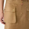 Mini-saias bege de algodão com bolsos