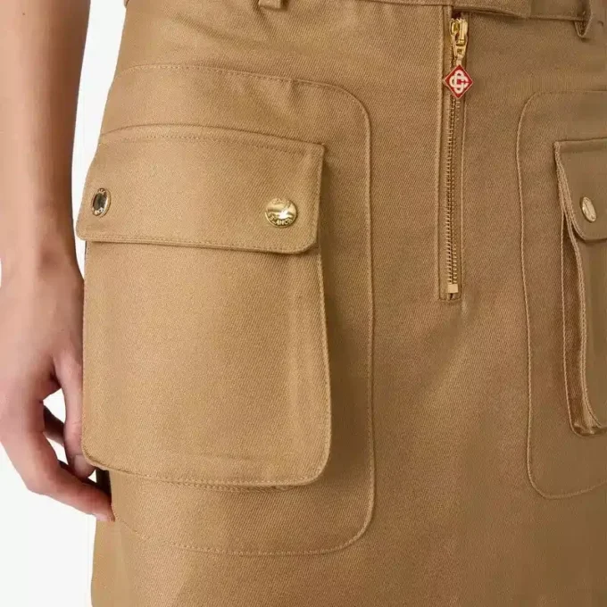 Mini-saias bege de algodão com bolsos