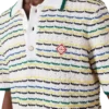 Polo de calções com costura Tuck Polo de calções com costura Tuck