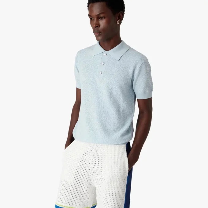 Polo de calções com monograma em ponto de malha azul Polo de calções com monograma em ponto de malha azul