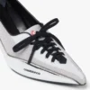 Sapatos de salto alto em pele prateada