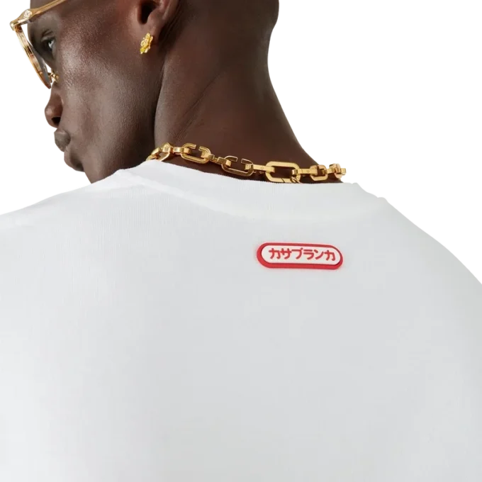 T-shirt de manga curta oversized com emblema T-shirt de manga curta oversized com emblema